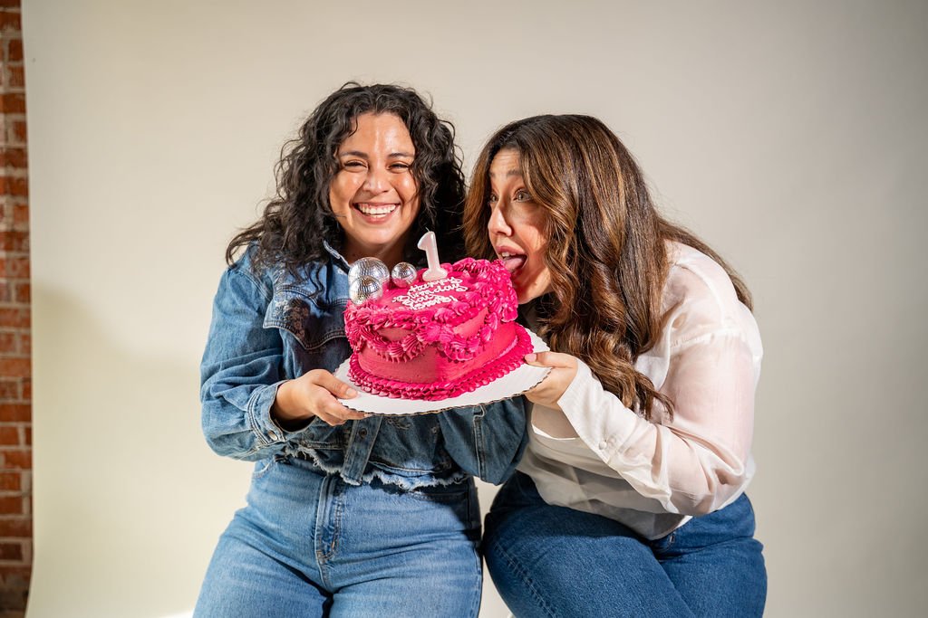 Pink number one birthday cake celebrating one year of Slay and Pray